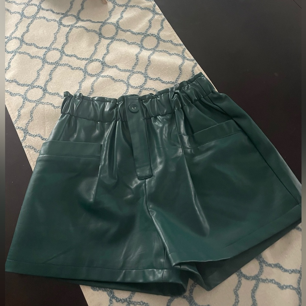 Molly Bracken. Leather shorts. Dark Green. Small! Stretch to 14” waist.